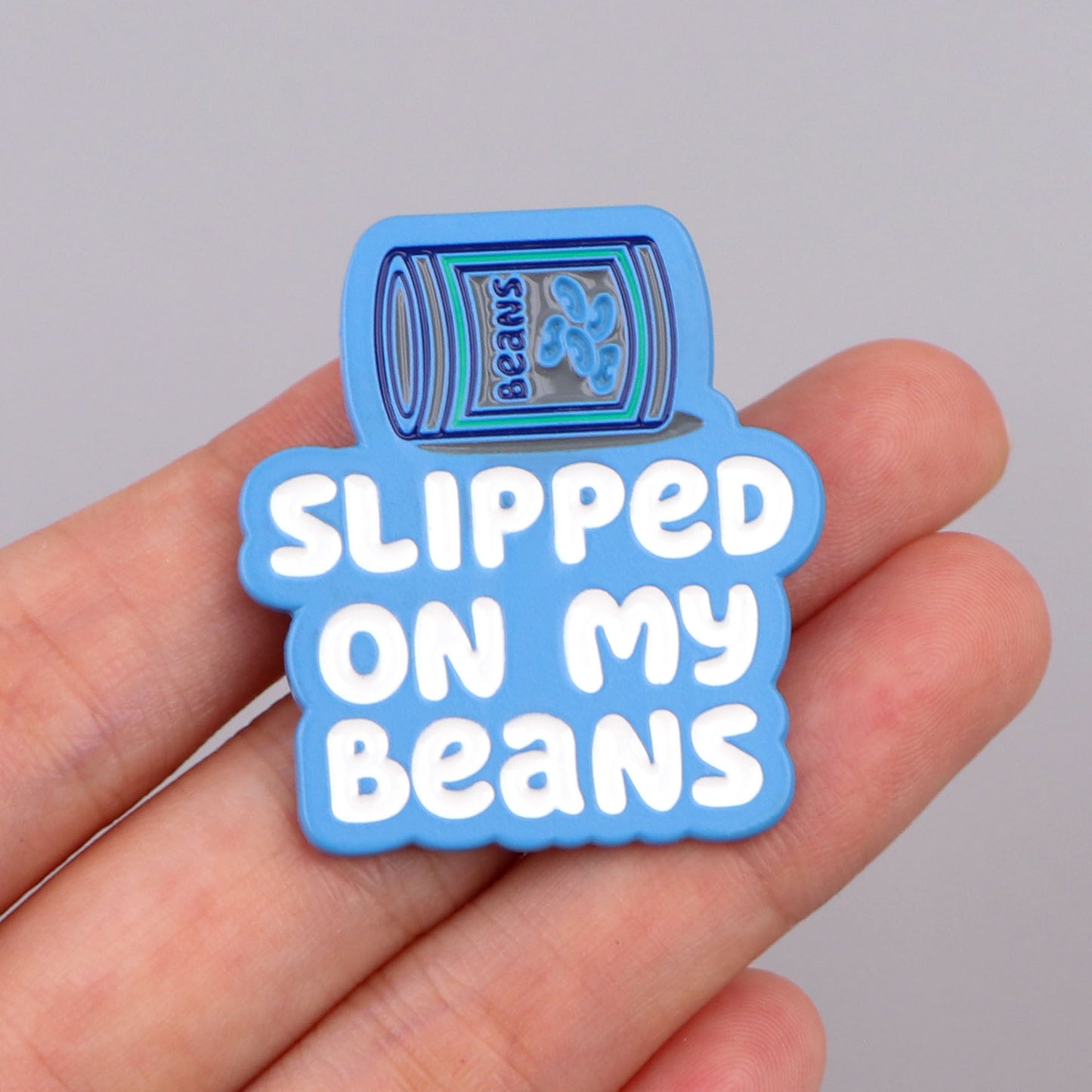 Slipped On My Beans" Enamel Pin - Versatile Lapel Brooch For Clothes, Backpacks & Briefcases | Decorative Accessory For Teens & Adults