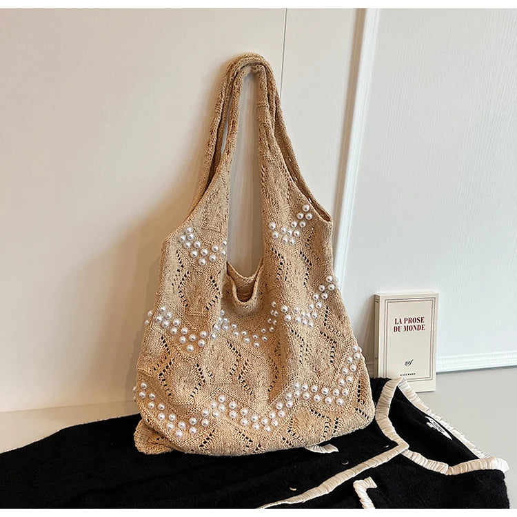 Hollow Out Large Capacity Knitting Shoulder Bags Pearl Unique Design Grace Sense of Luxury Hand Bags for Women 2024 Casual Tote