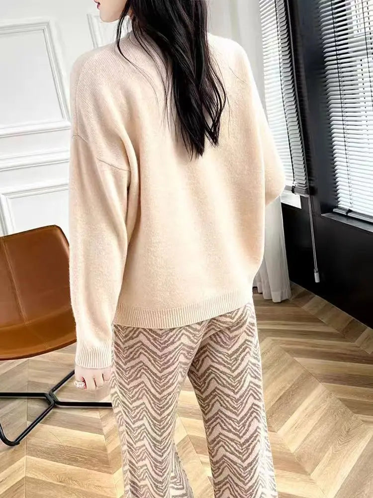 Autumn and winter new wool knitted sweater women's round neck loose slimming lazy style pullover sweater cashmere base sweater