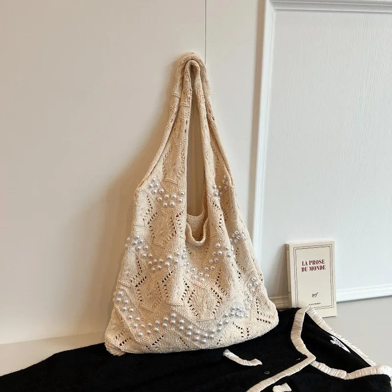 Hollow Out Large Capacity Knitting Shoulder Bags Pearl Unique Design Grace Sense of Luxury Hand Bags for Women 2024 Casual Tote