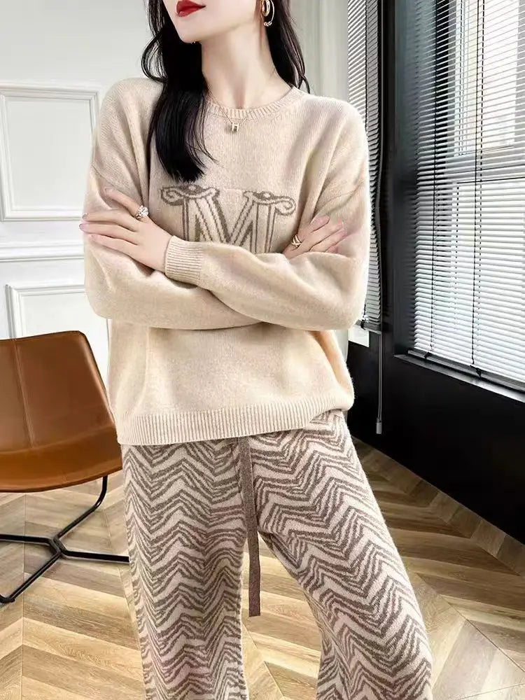 Autumn and winter new wool knitted sweater women's round neck loose slimming lazy style pullover sweater cashmere base sweater