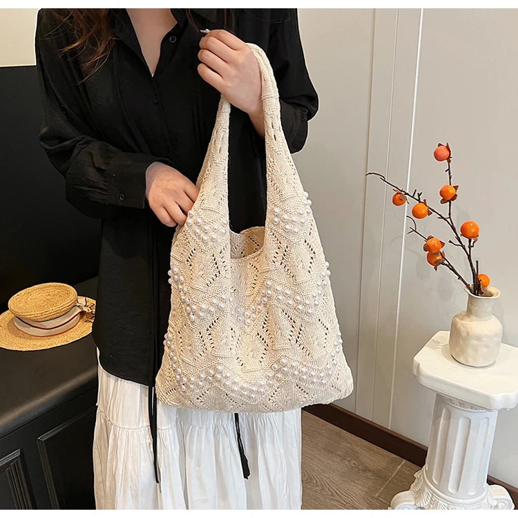 Hollow Out Large Capacity Knitting Shoulder Bags Pearl Unique Design Grace Sense of Luxury Hand Bags for Women 2024 Casual Tote