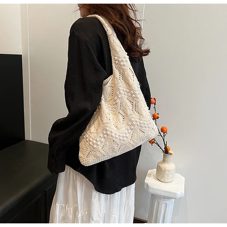 Hollow Out Large Capacity Knitting Shoulder Bags Pearl Unique Design Grace Sense of Luxury Hand Bags for Women 2024 Casual Tote