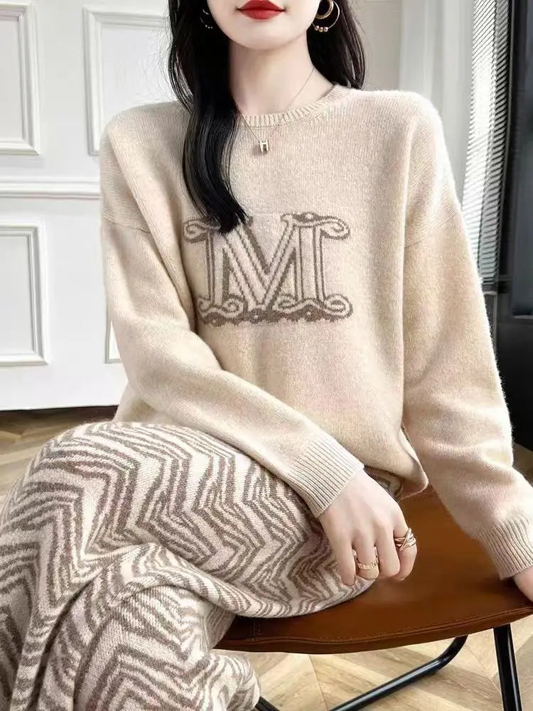 Autumn and winter new wool knitted sweater women's round neck loose slimming lazy style pullover sweater cashmere base sweater