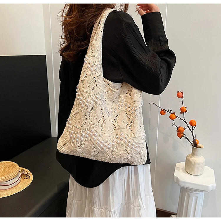 Hollow Out Large Capacity Knitting Shoulder Bags Pearl Unique Design Grace Sense of Luxury Hand Bags for Women 2024 Casual Tote