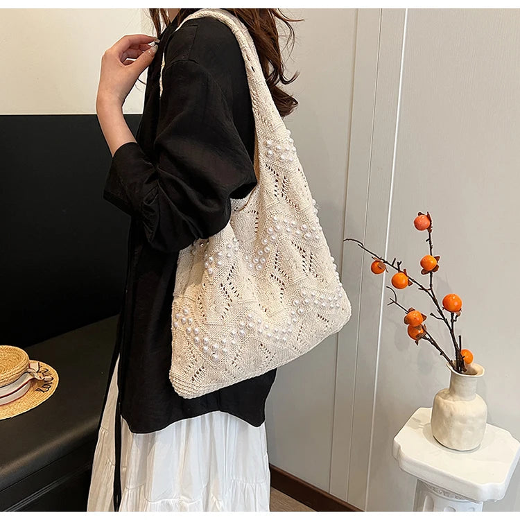 Hollow Out Large Capacity Knitting Shoulder Bags Pearl Unique Design Grace Sense of Luxury Hand Bags for Women 2024 Casual Tote