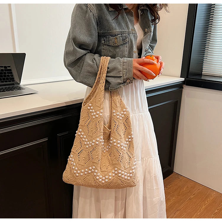 Hollow Out Large Capacity Knitting Shoulder Bags Pearl Unique Design Grace Sense of Luxury Hand Bags for Women 2024 Casual Tote